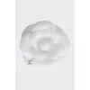 Brooch in the form of a camellia with a brand logo