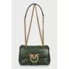 Green leather bag with brand logo
