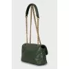 Green leather bag with brand logo