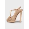 Pink sandals with gold decor