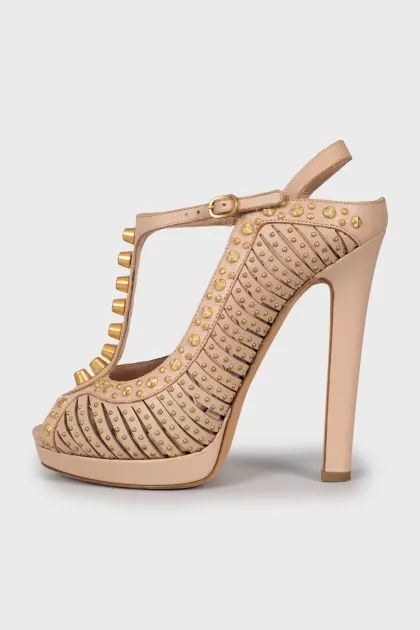 Pink sandals with gold decor