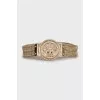 Metallic belt in gold color