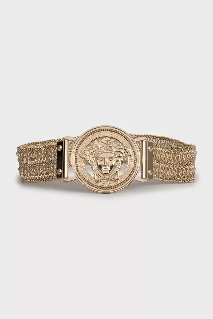 Metallic belt in gold color