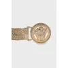 Metallic belt in gold color