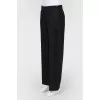 Wide black trousers