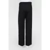 Wide black trousers