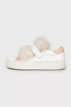 Leather sneakers decorated with fur