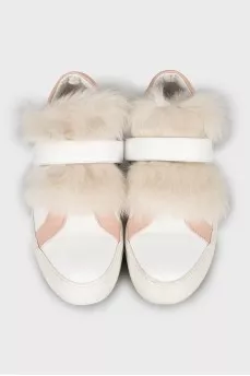 Leather sneakers decorated with fur