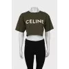 Green top with signature print