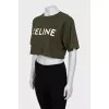 Green top with signature print
