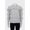 Knitted sweater in gray color