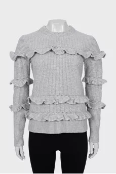 Knitted sweater in gray color