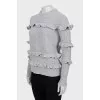 Knitted sweater in gray color