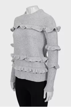 Knitted sweater in gray color