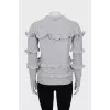 Knitted sweater in gray color