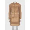 Brown suit with leather elements