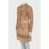Brown suit with leather elements