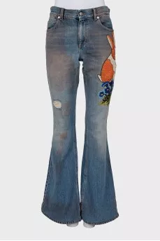 Flared jeans with embroidery