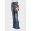 Flared jeans with embroidery