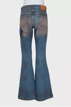 Flared jeans with embroidery