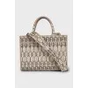 Beige bag with signature print