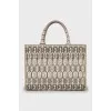 Beige bag with signature print