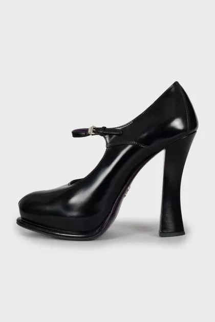 Black leather shoes with a figured heel