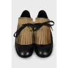 Leather shoes with gold fringe