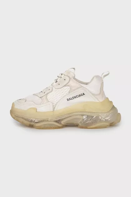 Sneakers with brand logo