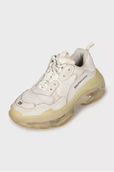 Sneakers with brand logo