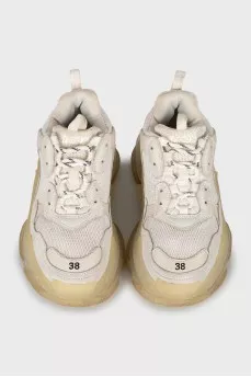 Sneakers with brand logo