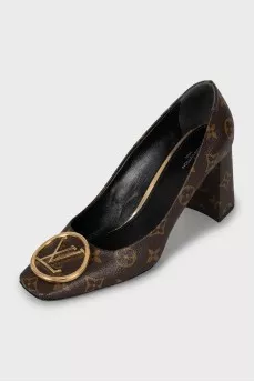 Shoes decorated with the company logo