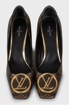 Shoes decorated with the company logo