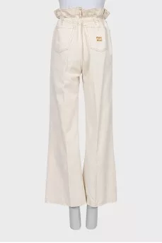 Бежеві джинси на високій посадці