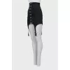Skirt decorated with hooks