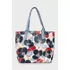 Floral print bag with tag