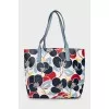 Floral print bag with tag
