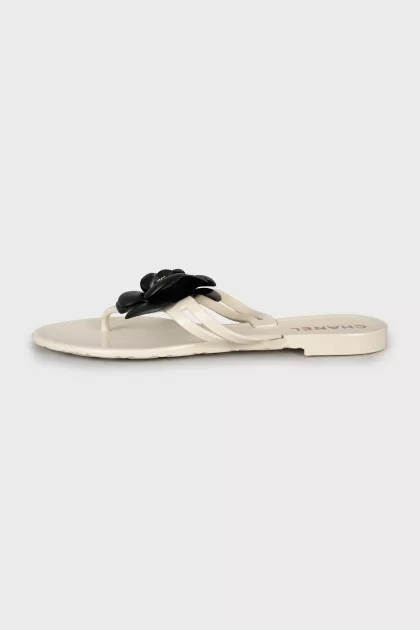 The flip flops are decorated with flowers