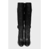 Leather boots with straps and stiletto heels