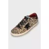 Suede sneakers with animal print