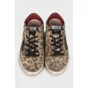 Suede sneakers with animal print