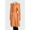 Orange trench coat with belt