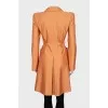 Orange trench coat with belt
