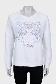 Sweatshirt with embroidery and perforation