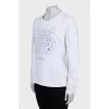 Sweatshirt with embroidery and perforation