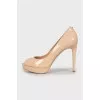 Beige patent leather shoes