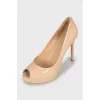 Beige patent leather shoes