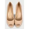 Beige patent leather shoes