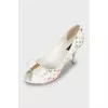 Shoes decorated with bows