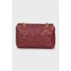 Leather bag with embroidered logo